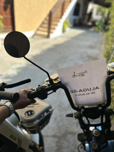 a sign on the side of a motor bike at Anexo Aldeia Búzios in Búzios