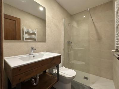 a bathroom with a sink and a toilet and a shower at Casa Rural Elizalde 