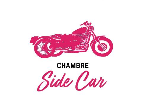 a red motorcycle parked next to a side car at hotelF1 Brétigny sur Orge in Brétigny-sur-Orge