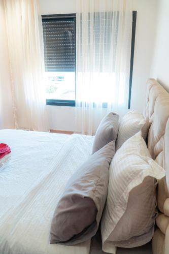 Postel nebo postele na pokoji v ubytování cozy appartement, convenient local