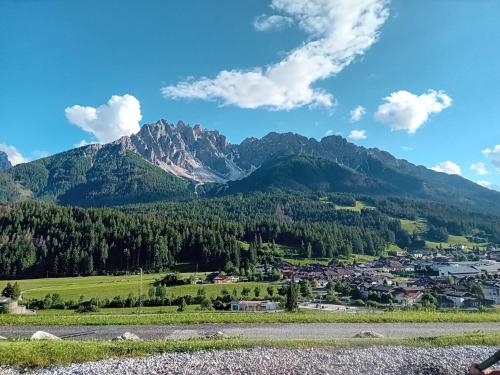a view of a town in the mountains at Im Kranzhof in San Candido