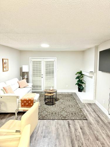 a living room with a couch and a table at Quiet Quarter 1Br1Ba by Dallas north tollway and Med in Addison