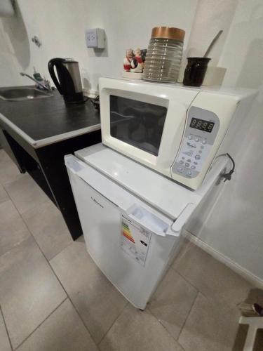 Η κουζίνα ή μικρή κουζίνα στο Departamento cerca de todo en Río Grande