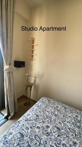 a bedroom with a bed and a window at Crown Paradise Beach Lagoon Studio in Sal Rei