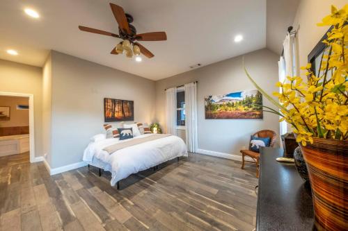 a bedroom with a bed and a ceiling fan at Historic Mountain Retreat - Near Boreal - 3 Kings in Emigrant Gap