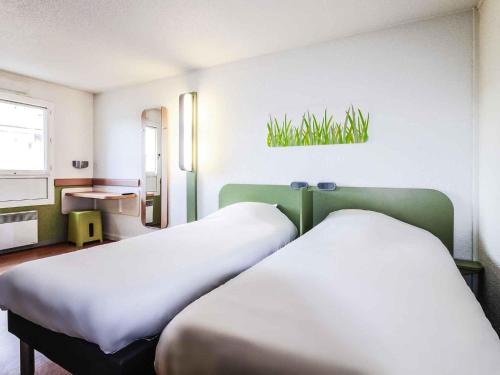 Ibis budget Périgueuxにあるベッド