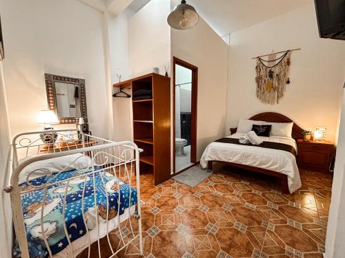 เตียงในห้องที่ Casona Albarelo