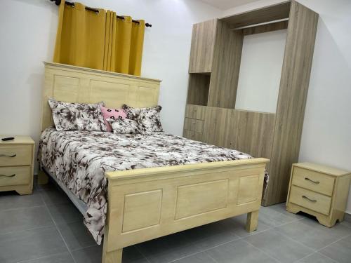 Ένα ή περισσότερα κρεβάτια σε δωμάτιο στο home in Macau