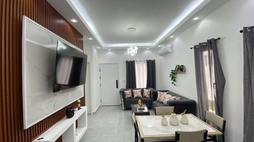 TV a/nebo společenská místnost v ubytování Villa macao