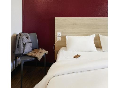 Katil atau katil-katil dalam bilik di hotelF1 Paris Porte de Châtillon