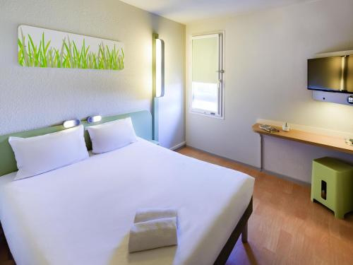 Katil atau katil-katil dalam bilik di Ibis Budget Bollene