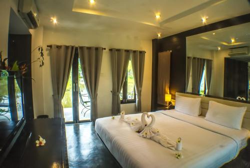 Huone majoituspaikassa Bura Lumpai Resort