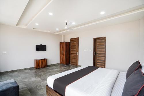 TV a/nebo společenská místnost v ubytování Hotel O Howdy