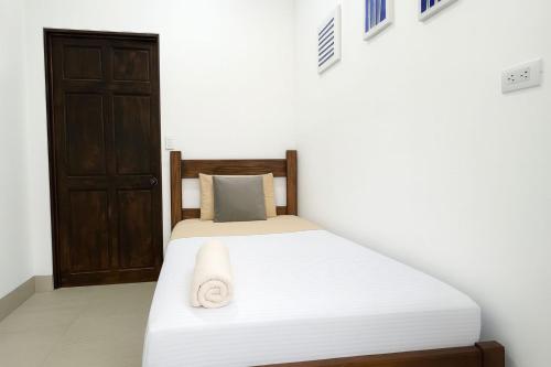 Postel nebo postele na pokoji v ubytování XIN Bed&Breakfast