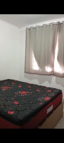 Postel nebo postele na pokoji v ubytování Casa na praia Paraná