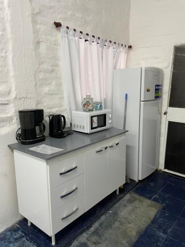Η κουζίνα ή μικρή κουζίνα στο Hostel El Paraíso-Adultos
