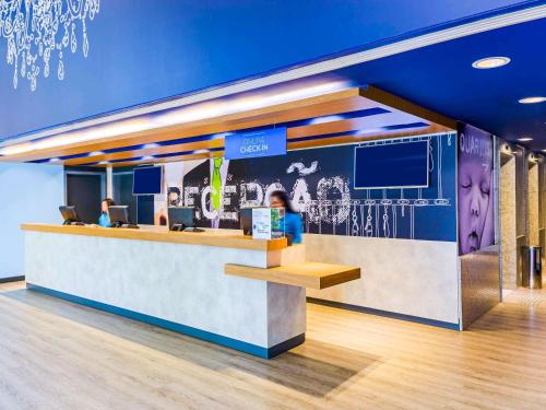 a reception counter in a dental office at ibis budget Sao Paulo Jardins in Sao Paulo