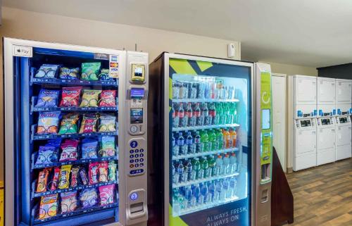 a vending machine filled with lots of soda at Extended Stay America Suites - New York City - LaGuardia Airport in Queens