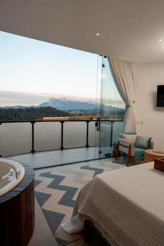 Cama o camas de una habitación en Chalés Rota dos Lagos