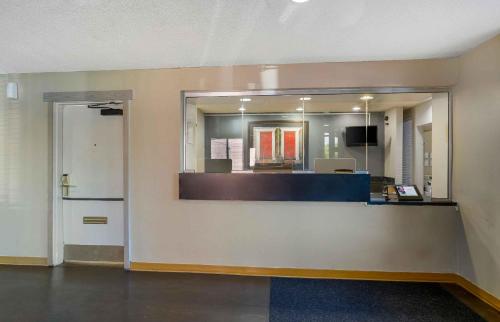a lobby with a mirror and a reception desk at Extended Stay America Suites - Philadelphia - Airport - Bartram Ave in Philadelphia