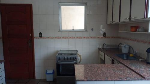 Dapur atau dapur kecil di Hospedagem JM