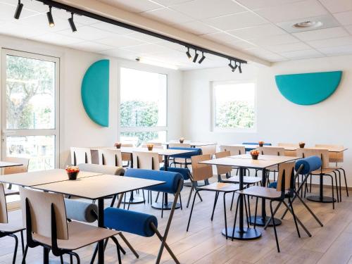 Restaurant ou autre lieu de restauration dans l'établissement ibis budget Carcassonne Aéroport - A61