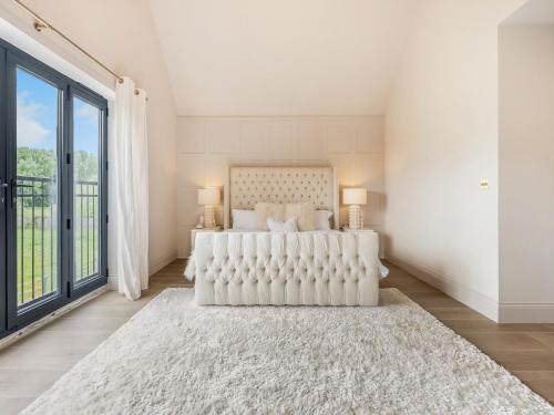 Ein Bett oder Betten in einem Zimmer der Unterkunft Moat Farm