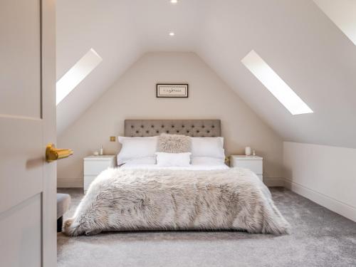 Ein Bett oder Betten in einem Zimmer der Unterkunft Moat Farm