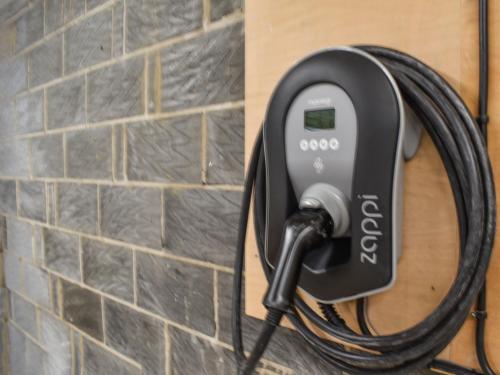 a phone is attached to a brick wall at 3 Le Dorney Villa - Uk49820 in Par