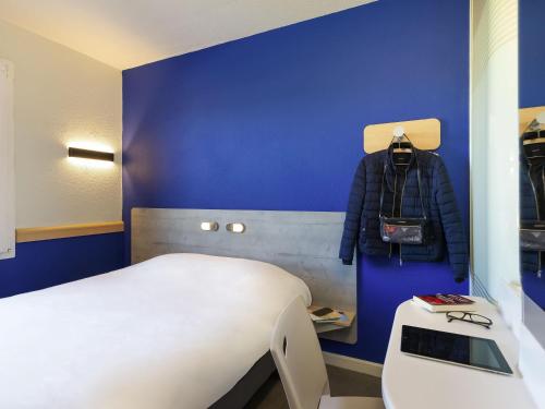 Katil atau katil-katil dalam bilik di ibis budget Saint-Maximin