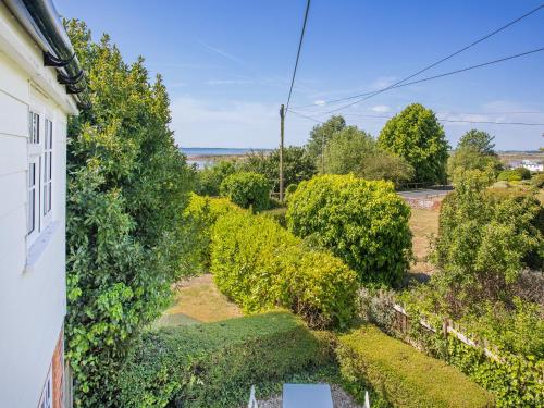 an aerial view of a garden from a house at Island Cottage in West Mersea