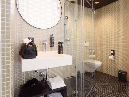 Koupelna v ubytování ibis Styles Bern City