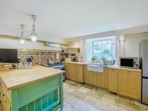 Kuchyň nebo kuchyňský kout v ubytování Winfields Manor