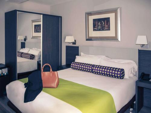 Katil atau katil-katil dalam bilik di Mercure Madrid Centro