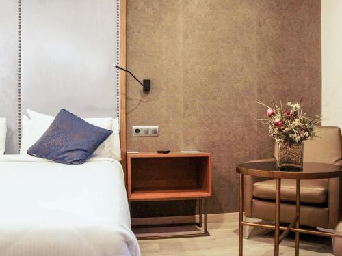 Katil atau katil-katil dalam bilik di Mercure Madrid Centro