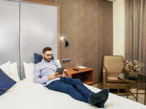 Katil atau katil-katil dalam bilik di Mercure Madrid Centro