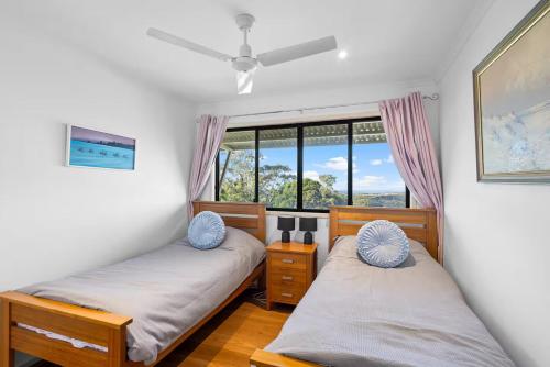 Ένα ή περισσότερα κρεβάτια σε δωμάτιο στο Blackall Bliss Hinterland Retreat