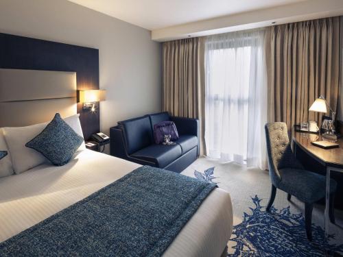 Postel nebo postele na pokoji v ubytování Mercure Edinburgh Haymarket