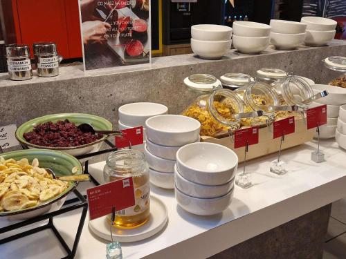 a buffet with many different types of food on a counter at ibis Warszawa Centrum in Warsaw