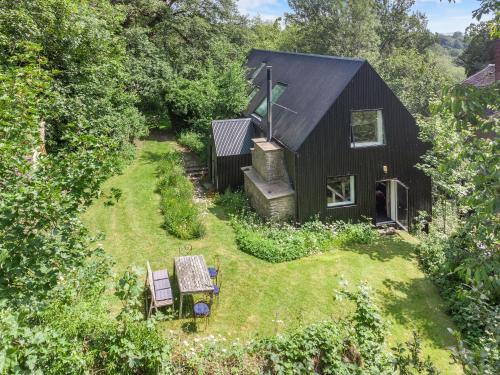 an aerial view of a black house with a yard at Croft Lodge Studio in Leominster