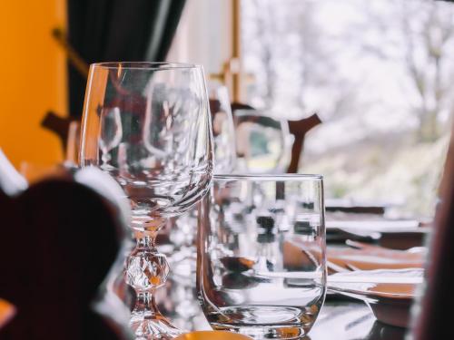 a table with wine glasses on top of it at Dalnaglar Castle - Uk7072 in Cray