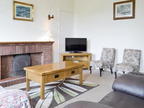 TV a/nebo společenská místnost v ubytování Moor Farm Cottage - Ukc3734