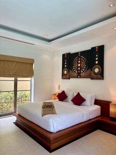 Ένα ή περισσότερα κρεβάτια σε δωμάτιο στο The Residence Resort