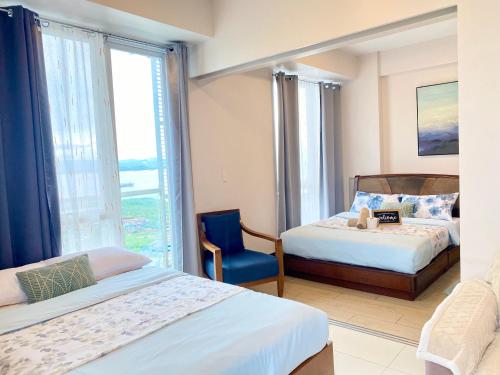 Ένα ή περισσότερα κρεβάτια σε δωμάτιο στο Studio with Balcony Seaview and Poolview