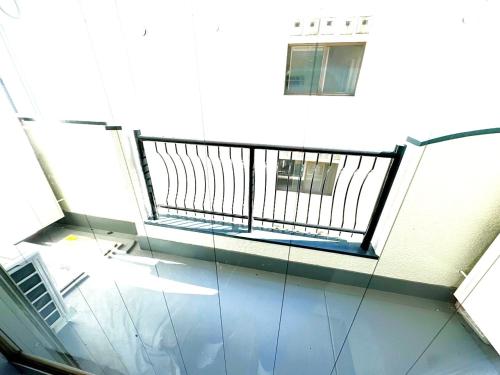 a glass floor in a building with a balcony at K2 square 502 in Nagoya