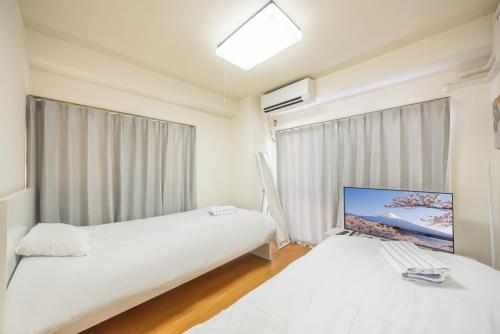 Ikebukuro 8 min walk, Kanamecho 6 min walk, 25sqm room, 2 guests, Direct access to Shinjuku, Shibuya, Tokyo, Ueno, 2 single beds