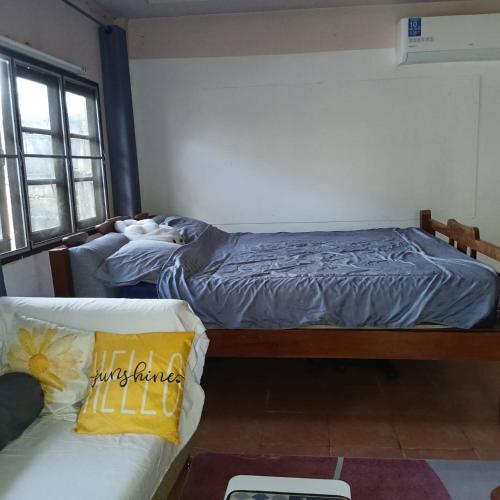Katil atau katil-katil dalam bilik di บ้านอนัตตา