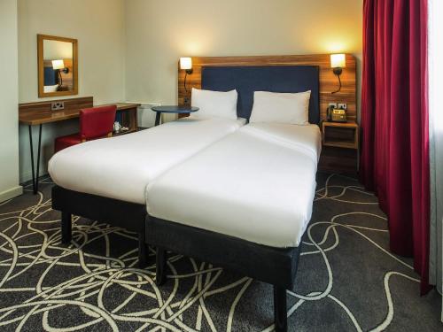 Letto o letti in una camera di ibis Styles Birmingham NEC & Airport