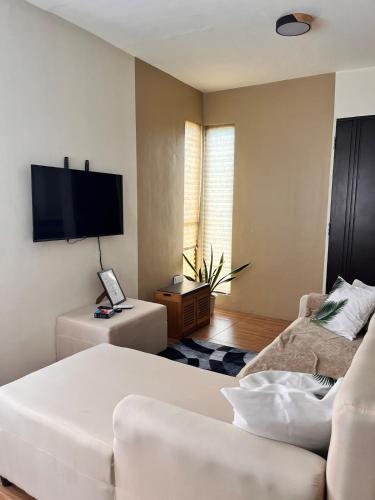 Телевизор и/или развлекательный центр в Casa Blessed Guest House