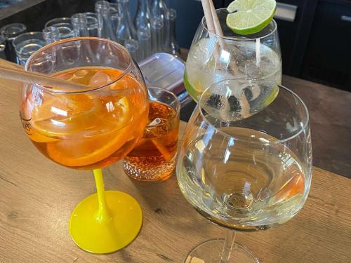 a group of wine glasses sitting on a table at ibis Styles Vierzon in Vierzon